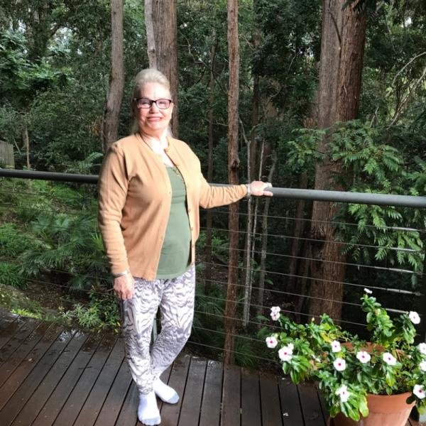 Carolyn on her Forest Deck